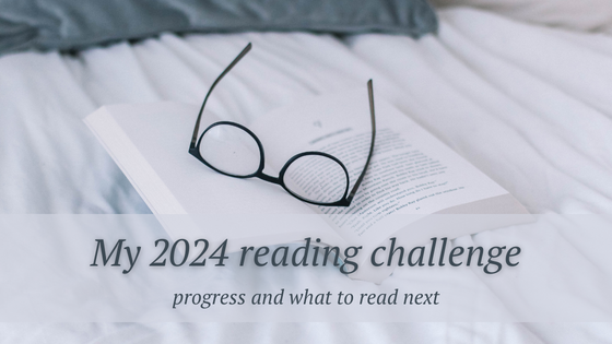 a pair of glasses and an open book on a bed with the words My 2024 reading challenge progress and what to read next