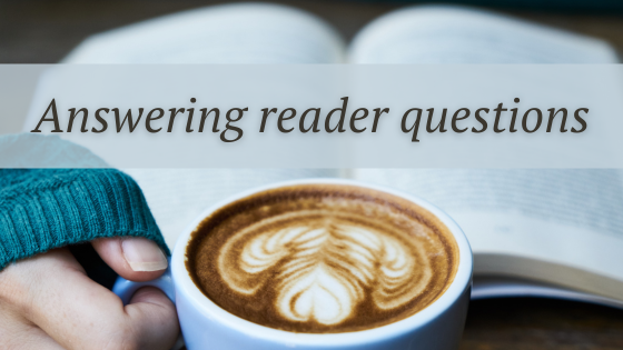 a woman's hand holding a cup of coffee and an open book with the words answering reader questions